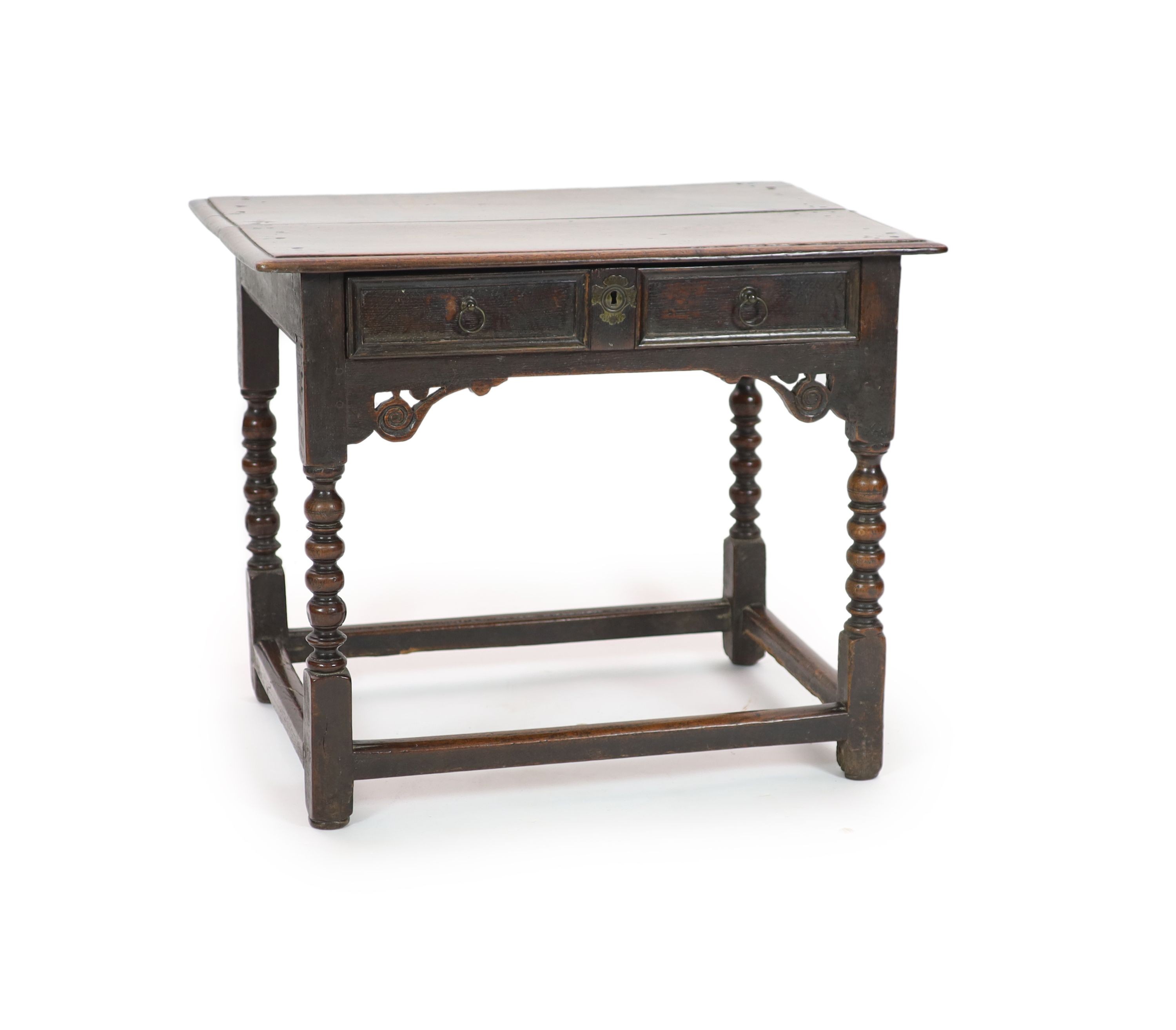 A Charles II oak side table H 68cm. W 82cm. D 56cm.